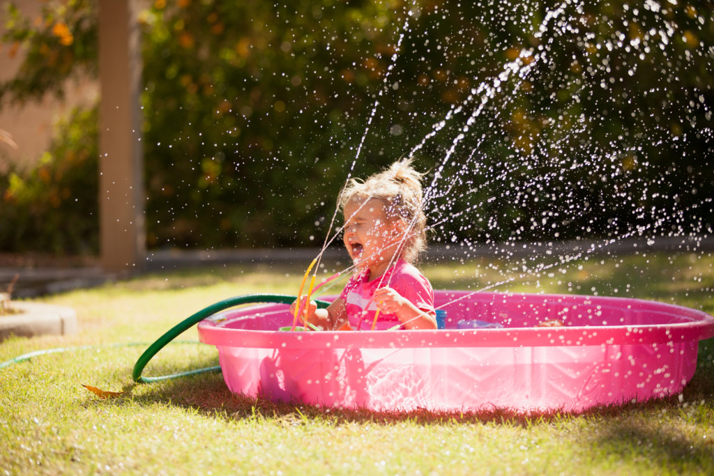 a baby pool or sprinkler can be a great idea for summer fun on a budget